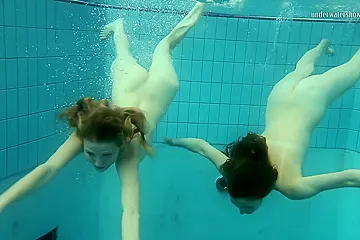 Nastya Undresses Libuse In The Pool Like A Lesbian - porn video