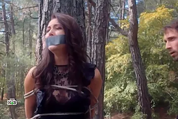 Russian Woman Tape Gagged And Tied To A Tree - porn video