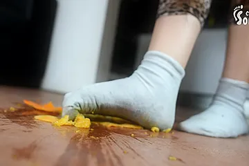 Wild Brunette In Socks Crashes An Orange With Her Feet - porn video